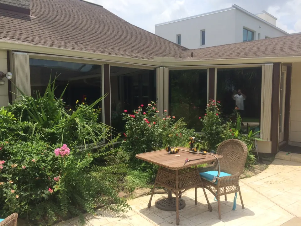 A Clear Lake area garden patio with its accordion shutters folded open